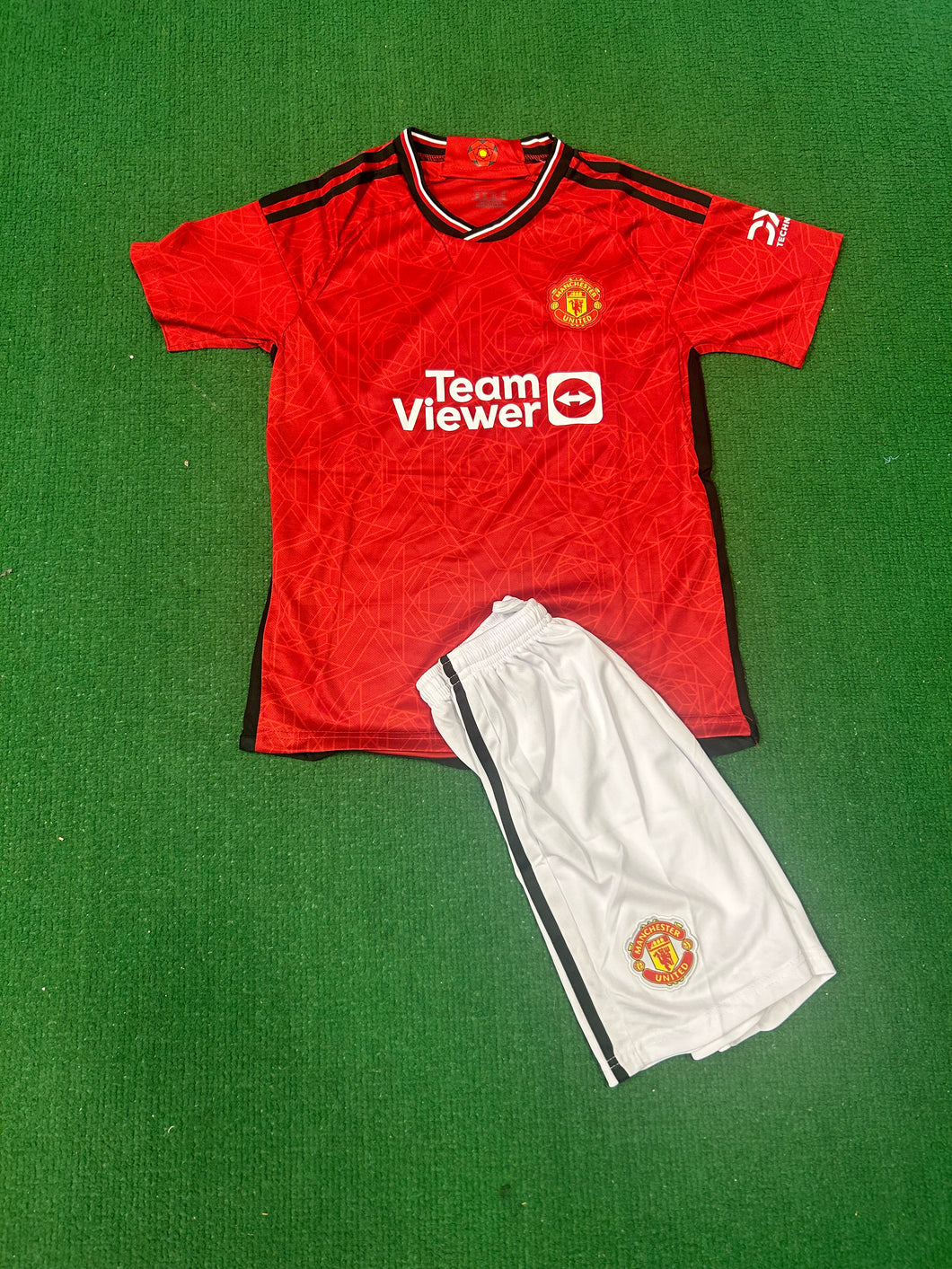 Manchester United 23/24 Youth Home Kit